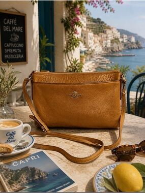 Coach brown 
Pebbled Leather Crossbody 53357